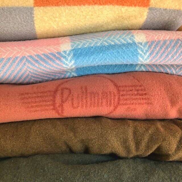 stack of pullman sweaters