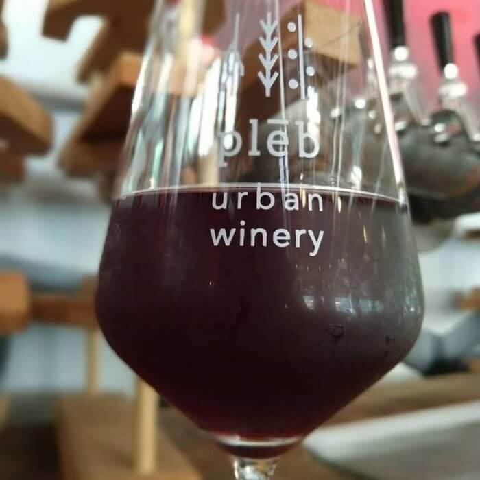 pleb urban winery glass of wine