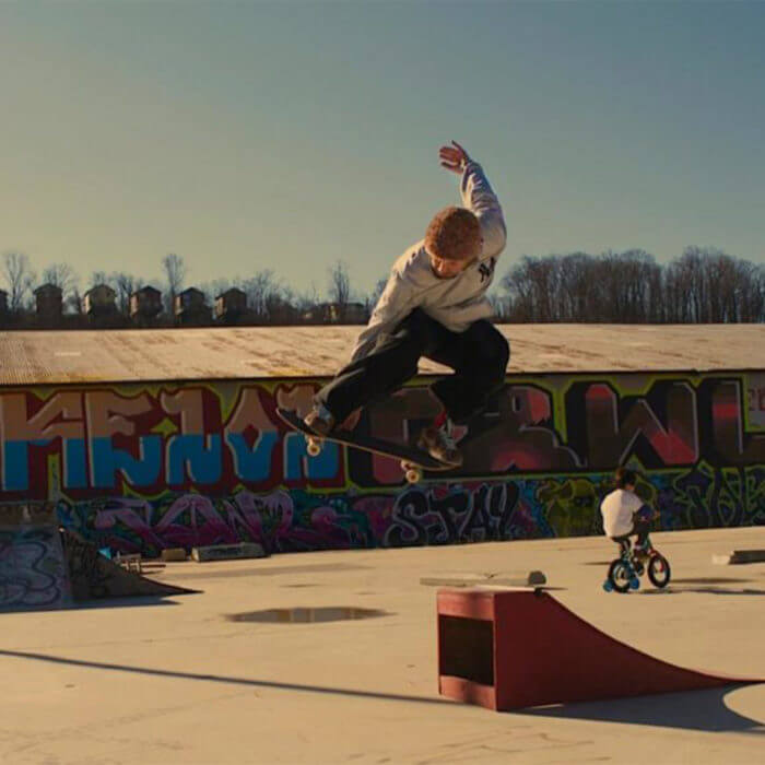 skater jumps off ramp at foundation skate park